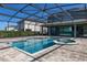 Screened pool and spa with paver deck at 370 Burma St, Kissimmee, FL 34747