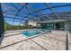 Spacious pool and spa with screened enclosure at 370 Burma St, Kissimmee, FL 34747