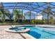 Enjoy this relaxing screened pool and spa at 370 Burma St, Kissimmee, FL 34747