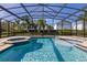 Enjoy this relaxing screened pool and spa at 370 Burma St, Kissimmee, FL 34747
