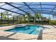 Enjoy this relaxing screened pool and spa at 370 Burma St, Kissimmee, FL 34747