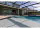 Relax in this screened pool and spa at 370 Burma St, Kissimmee, FL 34747