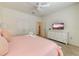 Bedroom with king-size bed and en-suite bathroom at 4723 Terrasonesta Dr, Davenport, FL 33837