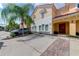 Two-story townhome with parking and palm trees at 4723 Terrasonesta Dr, Davenport, FL 33837