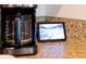 Kitchen counter with coffee maker and Alexa at 4723 Terrasonesta Dr, Davenport, FL 33837