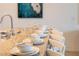 Island with seating for six and granite countertop at 4723 Terrasonesta Dr, Davenport, FL 33837