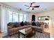 Spacious living room with sectional sofa and large windows at 4723 Terrasonesta Dr, Davenport, FL 33837
