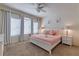 Spacious main bedroom with a king-size bed and soft decor at 4723 Terrasonesta Dr, Davenport, FL 33837