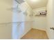 Large walk-in closet with wire shelving and hanging rods at 4723 Terrasonesta Dr, Davenport, FL 33837