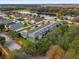 Community aerial view, featuring lake, pool and many community amenities at 4731 Capital Blvd, Saint Cloud, FL 34769