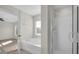 Bathroom with bathtub, shower, and access to bedroom at 4731 Capital Blvd, Saint Cloud, FL 34769