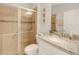 Clean bathroom with shower, toilet and granite countertop at 580 Cantabria Dr, Davenport, FL 33837