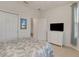 Bright bedroom with a comfortable bed and plenty of closet space at 580 Cantabria Dr, Davenport, FL 33837