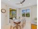 Bright dining area with sliding glass doors leading to backyard at 580 Cantabria Dr, Davenport, FL 33837