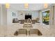 Kitchen island with double sink, tray, and view into Gathering room at 580 Cantabria Dr, Davenport, FL 33837