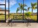 Peaceful lanai with seating and a view of nature at 580 Cantabria Dr, Davenport, FL 33837