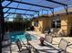 Enjoy this refreshing pool and spacious patio area at 580 Cantabria Dr, Davenport, FL 33837