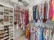 Large walk-in closet with ample shelving and hanging space at 580 Cantabria Dr, Davenport, FL 33837