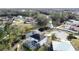 Aerial view of house, highlighting the canal and backyard at 605 Pinehurst Ct, Kissimmee, FL 34758
