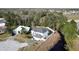 Aerial view showcasing house location near a canal at 605 Pinehurst Ct, Kissimmee, FL 34758