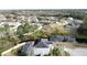 Wide aerial view of house and surrounding neighborhood at 605 Pinehurst Ct, Kissimmee, FL 34758