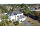 Aerial view of house, showcasing backyard and canal view at 605 Pinehurst Ct, Kissimmee, FL 34758