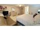 Comfortable guest bedroom with a queen bed and plenty of closet space at 605 Pinehurst Ct, Kissimmee, FL 34758