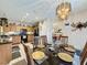 Kitchen with wood cabinets, black appliances, and a breakfast nook at 605 Pinehurst Ct, Kissimmee, FL 34758