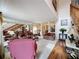 Open living room with hardwood floors and comfortable seating at 605 Pinehurst Ct, Kissimmee, FL 34758