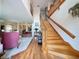 Elegant wooden staircase leading to the upper level of the home at 605 Pinehurst Ct, Kissimmee, FL 34758