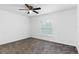 Spacious bedroom with neutral carpet and ceiling fan at 832 Marion Oaks Mnr, Ocala, FL 34473