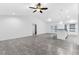 Open concept living room with tile floors and high ceilings at 832 Marion Oaks Mnr, Ocala, FL 34473