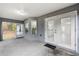Covered screened porch with access to the backyard at 832 Marion Oaks Mnr, Ocala, FL 34473