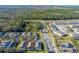 Aerial view showing a home's location in a residential neighborhood at 1201 Winding Willow Ct, Kissimmee, FL 34746