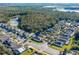 Aerial view showing a home's location in a residential neighborhood at 1201 Winding Willow Ct, Kissimmee, FL 34746