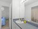 Clean bathroom with single sink vanity and shower/tub combo at 1201 Winding Willow Ct, Kissimmee, FL 34746