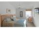 Comfortable Primary bedroom with king-size bed and sitting area at 1201 Winding Willow Ct, Kissimmee, FL 34746