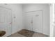 Bright entryway with double doors and a small table at 1201 Winding Willow Ct, Kissimmee, FL 34746