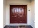 Double front doors with a welcome mat at 1201 Winding Willow Ct, Kissimmee, FL 34746