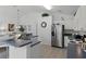 Kitchen with stainless steel appliances and an island at 1201 Winding Willow Ct, Kissimmee, FL 34746