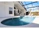 Screened pool and patio furniture at 1201 Winding Willow Ct, Kissimmee, FL 34746