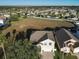 Aerial view showing the house and surrounding neighborhood at 124 Cassia Dr, Davenport, FL 33897