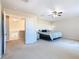 Large bedroom with a view of the upper loft area at 124 Cassia Dr, Davenport, FL 33897