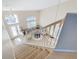 View down the staircase into the living room at 124 Cassia Dr, Davenport, FL 33897