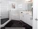 Spa-like bathroom with a walk-in shower, soaking tub, and double vanity at 152 Pinewood Dr, Davenport, FL 33896