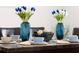 Close-up of marble dining table with place settings and centerpiece at 152 Pinewood Dr, Davenport, FL 33896