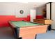 Fun game room with pool table and foosball table at 152 Pinewood Dr, Davenport, FL 33896