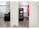 Hallway with views into two bedrooms, one with a bunk bed at 152 Pinewood Dr, Davenport, FL 33896