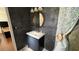 Bathroom with dark tile, vanity, and shower at 1592 Martin Luther King Ne Blvd, Winter Haven, FL 33881