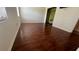 Large bedroom with hardwood floors, a closet, natural light, and is ready for new residents at 1592 Martin Luther King Ne Blvd, Winter Haven, FL 33881